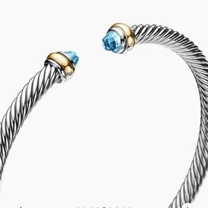 CLASSIC CABLE BRACELET
Sterling Silver with 18K Yellow Gold and Blue Topaz, 4mm